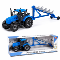 Traktor  Progress inercyjny z pługiem niebieski w pudełku.jpg